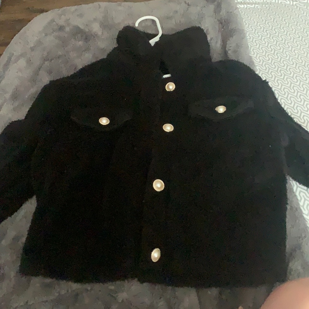 Black fluffy coat